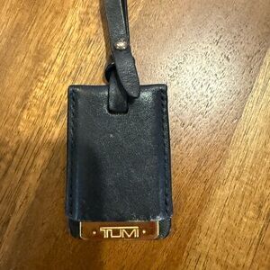 Tumi Black Leather Tag with Gold Accent